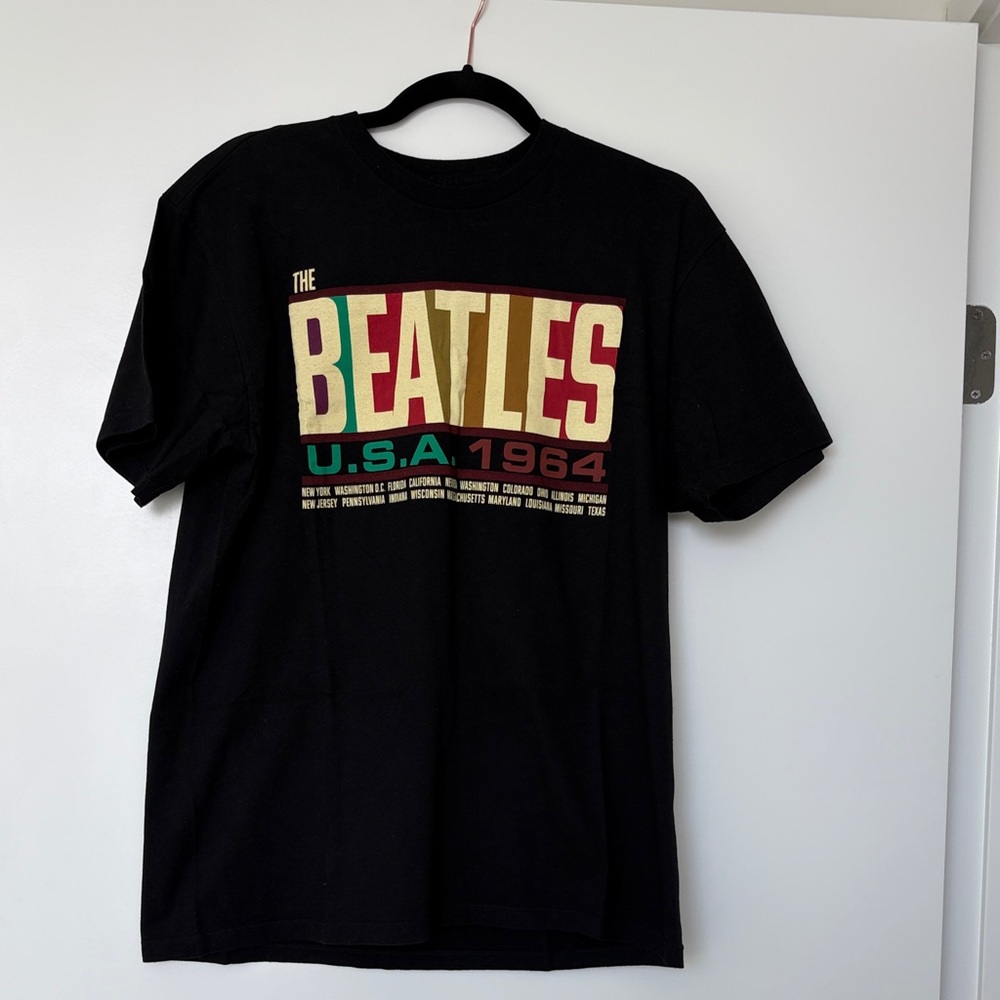 The Beatles 1964 USA Tour
Officially Licensed Black Short Sleeve T Shirt L